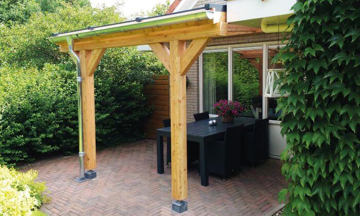 muuraanbouw veranda hout met antraciet betonpoeren