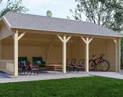 Wolfskap blokhut groot met loungesets in tuin